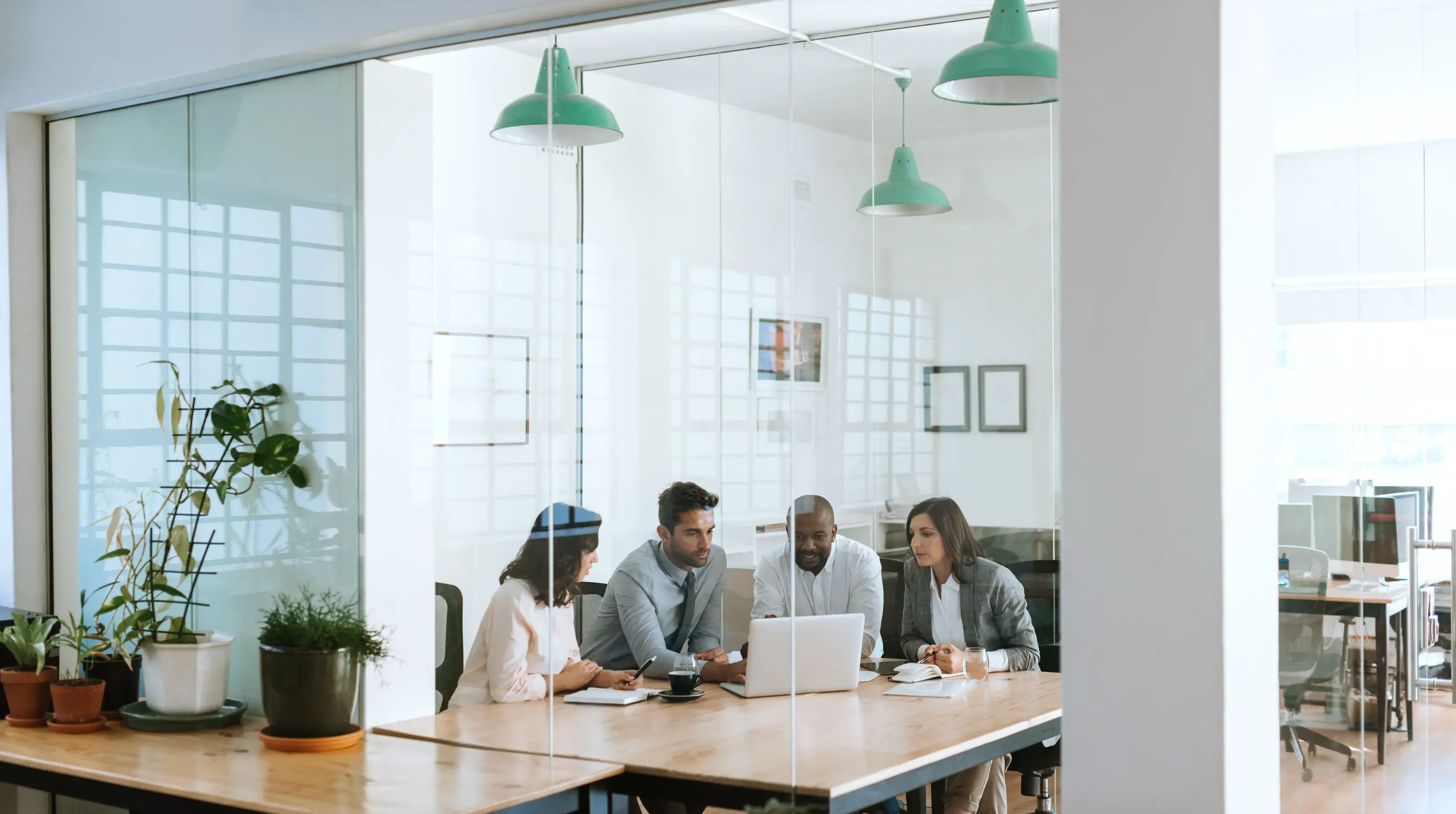 Diverse group of business people working on a laptop 